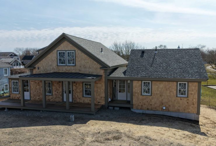 Aerial view of Chatham property with white cedar siding
